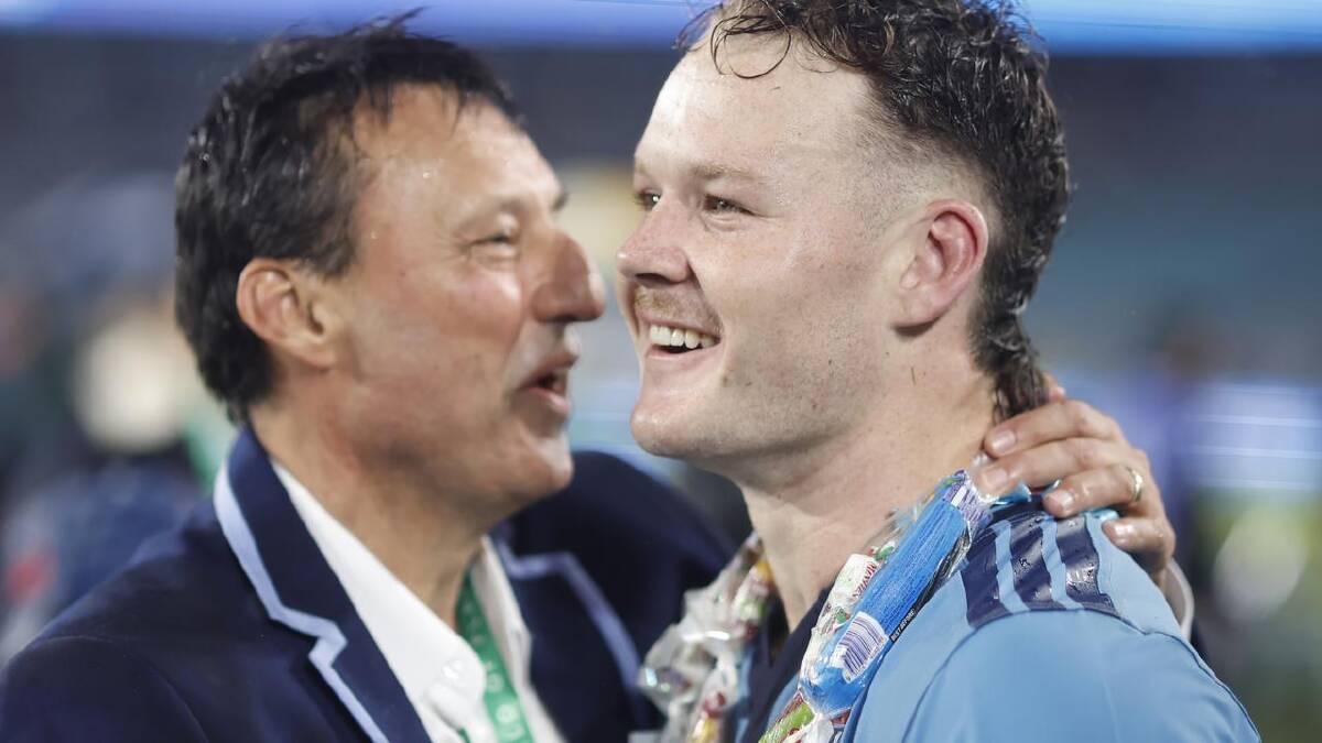 Blues coach Laurie Daley congratulates Ethan Strange after NSW's late victory in Sydney. (Mark Evans/AAP PHOTOS) Blues coach Laurie Daley congratulates Ethan Strange after NSW's late victory in Sydney. (Mark Evans/AAP PHOTOS)