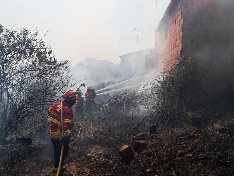 Firefighters have brought three major wildfires in Portugal under 'partial control'.