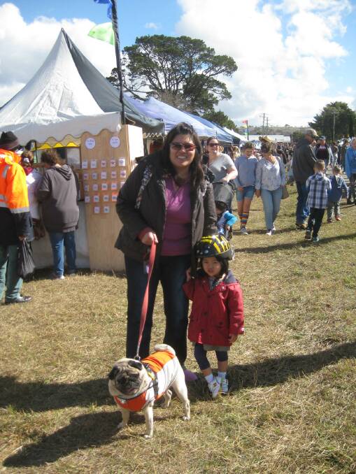 Maple Ko from Canberra with her 3 year old daughter Fleur and pet Pug Mingo were among the thousands who enjoyed the Collector Village Pumpkin Festival last Sunday (May 1).