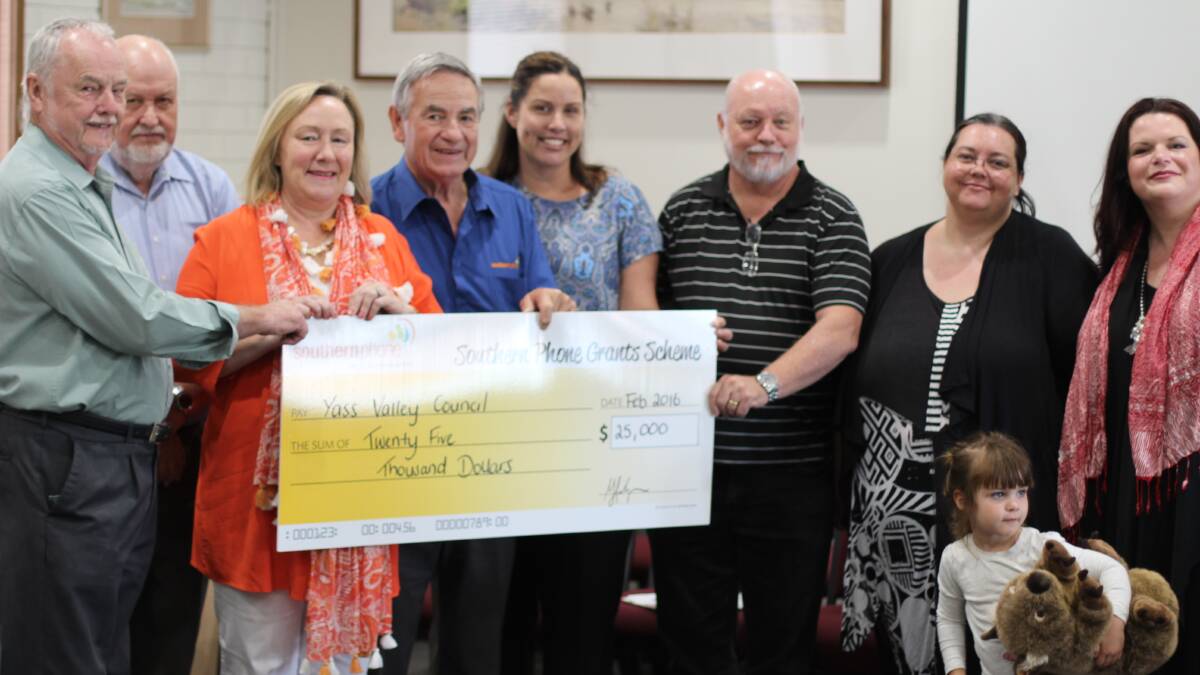 AWARD WINNERS: (Left) Mike Reid and Bob Evans from the Murrumbateman Progress association, Mayor Rowena Abbey, Bill Hilzinger, Southern Phones Chairman, Donna Wullaert from YECCA, Pastor Gary Brown from Vine Community Care, Katie Stuart and Cecilia Pavlovic from the Yass Valley Community Drug Action Team. Photo: Yass Tribune.
  
