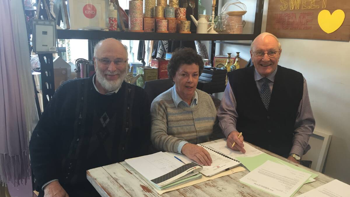 Ron Badger, Geraldine Doyle and Alfred McCarthy finalising Rae Burgess' estate.