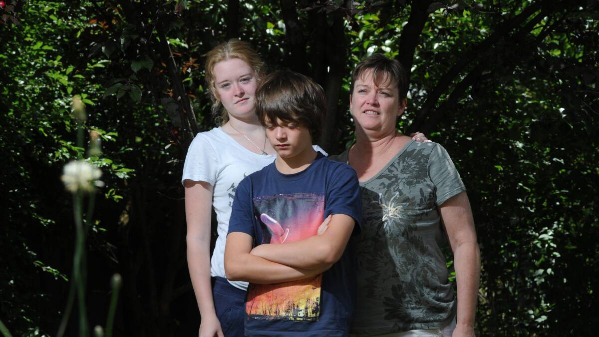 Fiona Vickery and her children Jay and Skye are waiting for answers regarding Wayne Vickery’s death at a construction site more than two years ago. Photo: Lannon Harley.