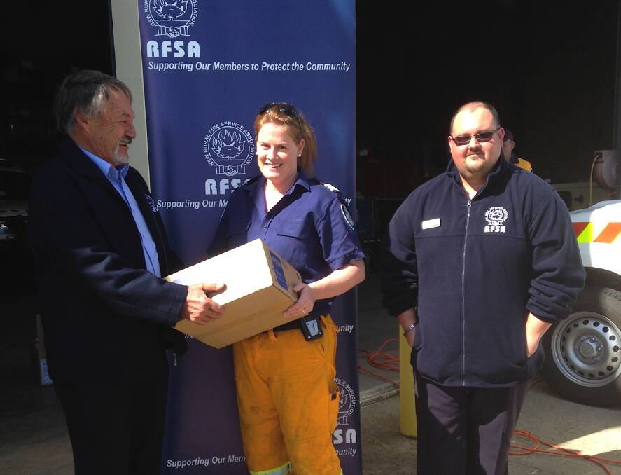 The RFSA recently provided grant money to the Gunning/Fish River RFS for purchase of vital equipment. From left is Rural Fire Service Association board director Chris Powell AFSM, Gunning/Fish River RFS captain Krystaal Hinds and RFSA Division 7 chairperson Nathan McDonald. Photo: Supplied.
