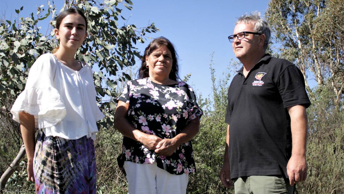 A younger generation Ngunnawal person, Tyahn Bell, joins Lillian and Brad Bell at Oak Hill to see the site where the felled scarred trees will go. Photo: Hannah Sparks