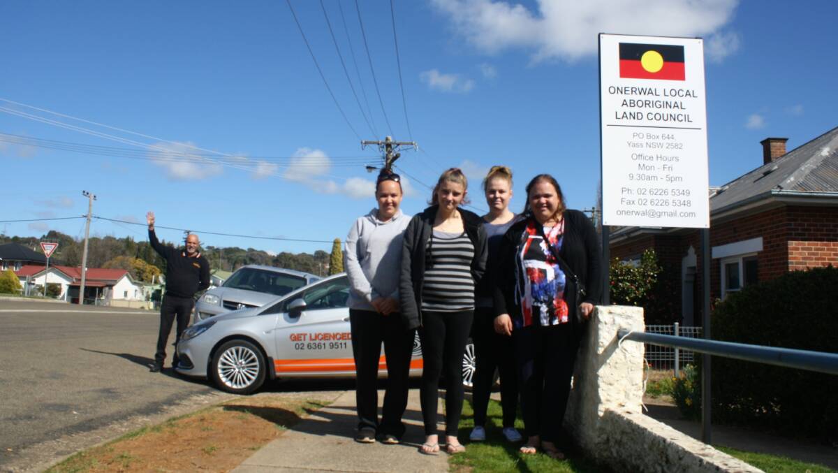 Brett Naden waves over new learners Alyssa, Tenille, Tanya and Leah at the Onerwal Local Aboriginal Land Council. Picture: Hannah Sparks