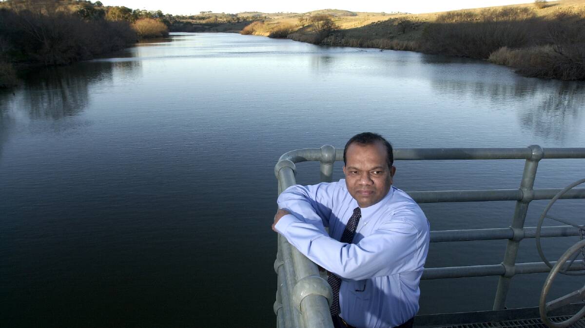 WATER IN SIGHT: Yass Valley Council’s senior water and sewer engineer, Siva Sivakumar, at the Yass Dam wall. Picture: Graham Tidy