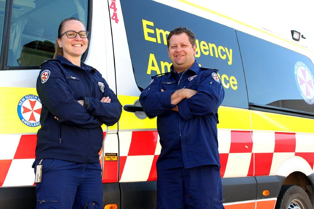 SAVING LIVES: Yass paramedic Belle Green (who attended the field days emergency) and Inspector Ben Hutchinson say firefighters' quick-thinking saved the man's life. Photo: Hannah Sparks