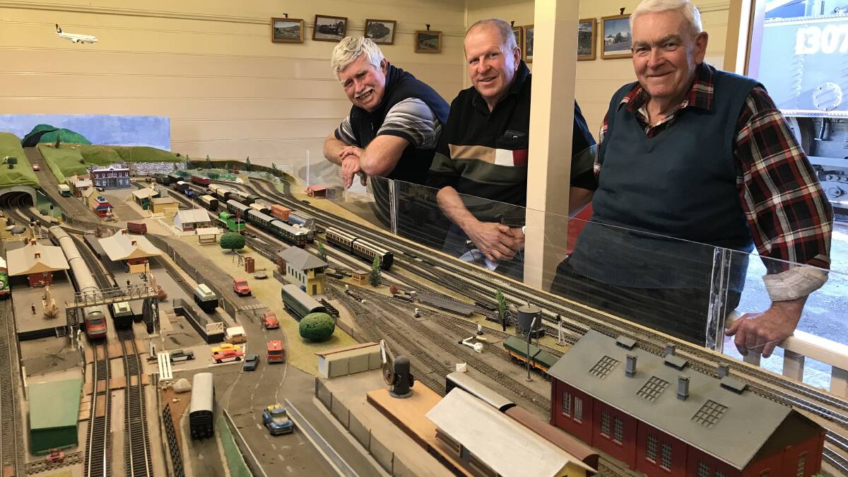 DEDICATION: Yass Railway Museum volunteers Bill Pigram, Bob Frank and Tony Hawker at the Harmsville model railway. Photo: Hannah Sparks