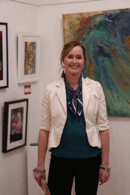 Nessa Lovell at her first solo exhibition 'Fluid' at the Yarralumla Gallery. Photo: Isobel Maddoch