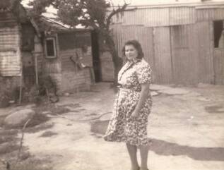 Dixie Byrne (nee Brown) outside of her house at Oak Hill. Photo: supplied by Dixie’s children