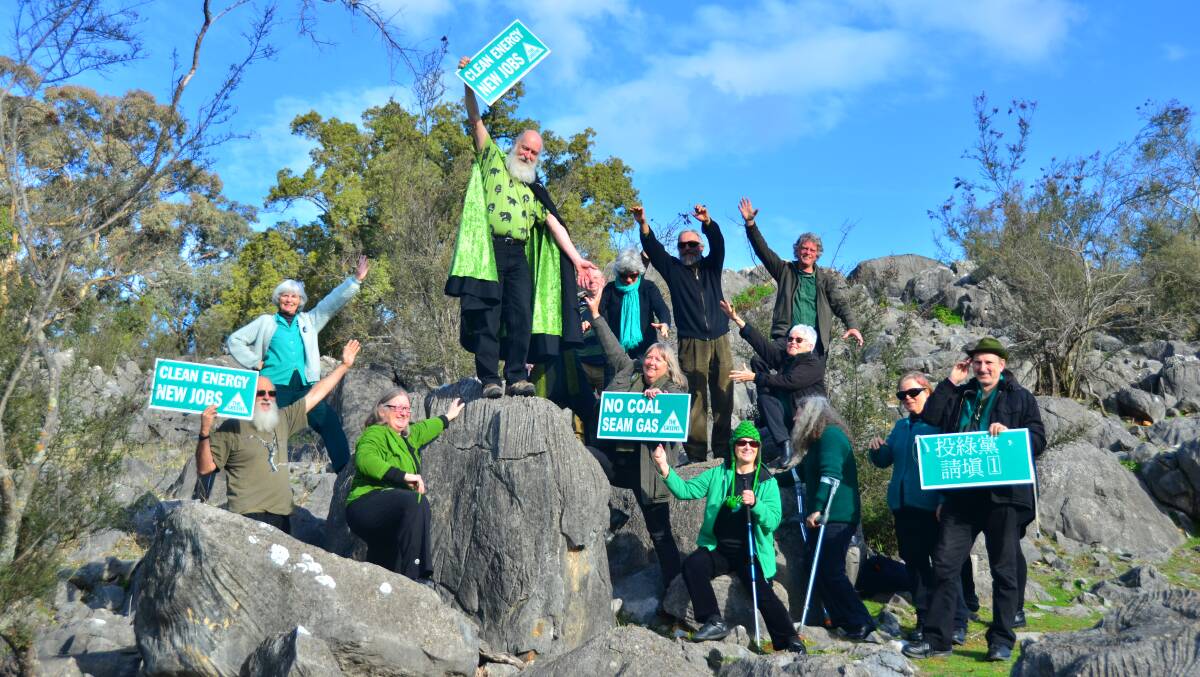 At the front line, outside of Carey’s Cave in Wee Jasper, the Ecopella choir joins dozens of Rise for Climate events across the country. Picture: supplied