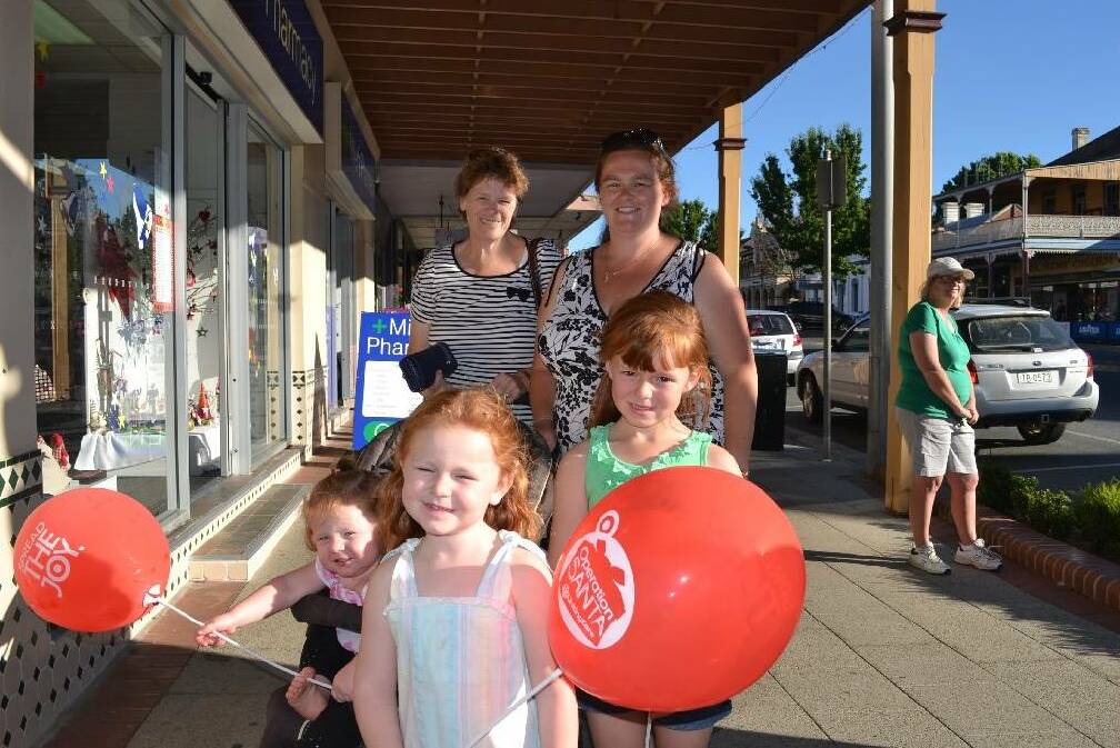 Shop till you pop, Yass: Therese Gold and Tania McPherson. Front: Grace (2), Molly (4) and Charlotte (6). Photo: Karan Gabriel.