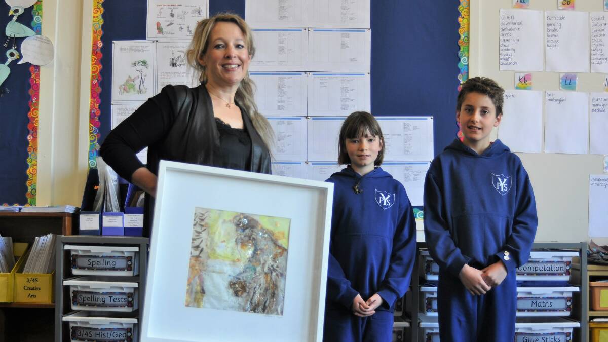 On display: Yass Public teacher Lisa Marple is donating 'Beach Birds' to the auction. Pictured with students Anzac Longley, year 4, and Harper Cross, year 5. Photo: Hannah Sparks
