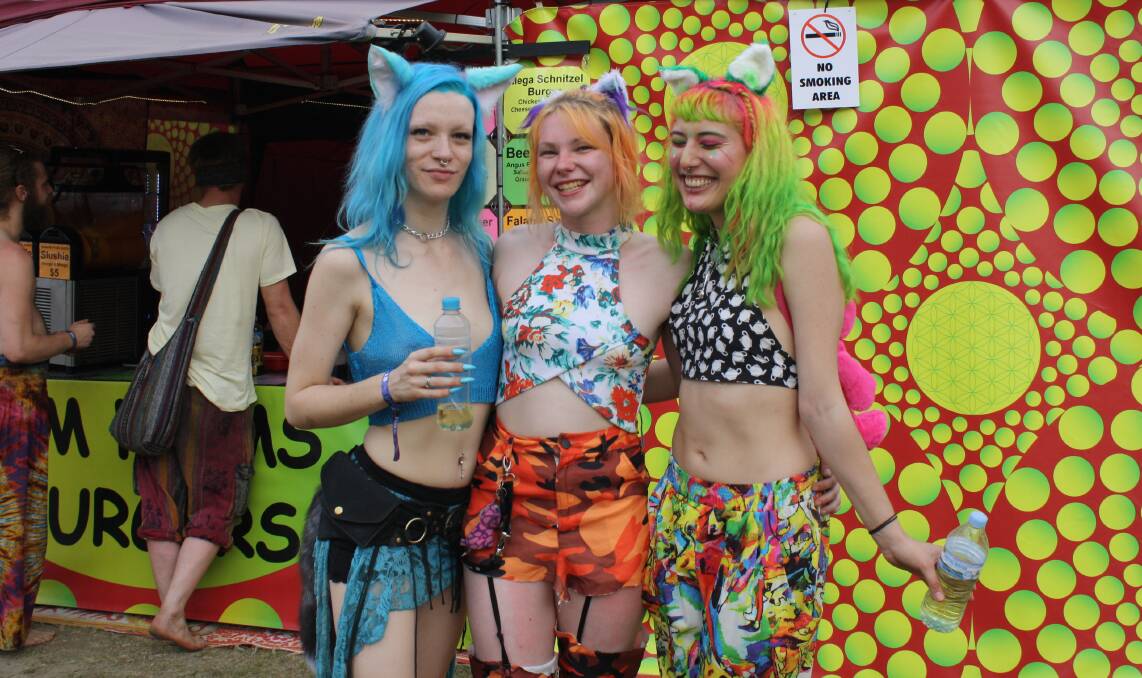 DRAGON DREAMING: Rhi, Cat and Holly are ready to have a good time at the festival. Picture: Hannah Sparks