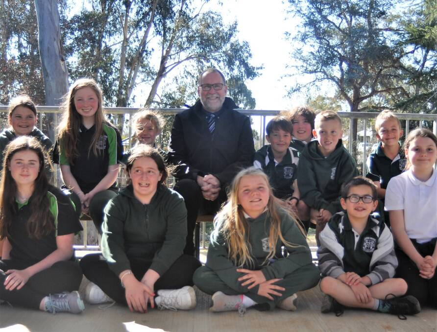 Students at Berinba Public School welcome their new principal Phil Katen. Photo: Hannah Sparks