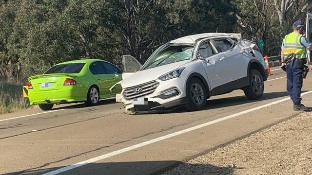 Three children and adult inside car that rolled twice on Hume Highway at Bookham