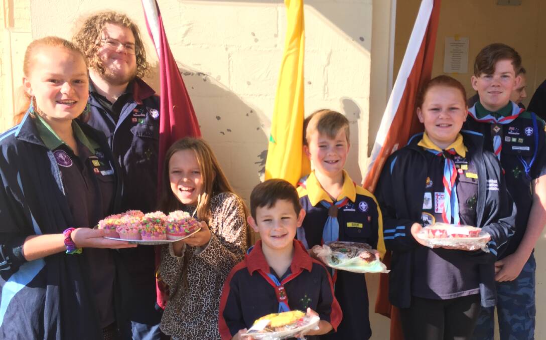 Don't miss a beat: Yass First Scouts Group grabs voters for their cake sale. Photo: Hannah Sparks