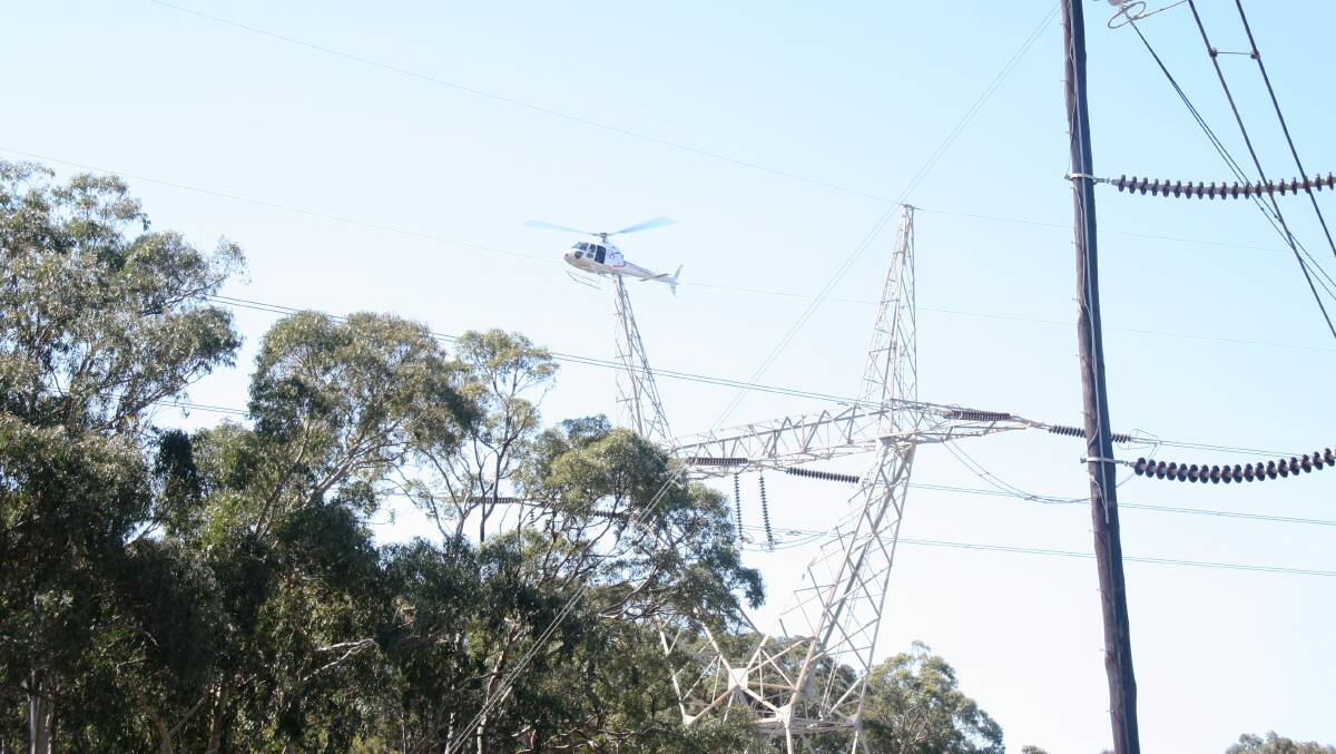 Annual inspection: TransGrid checks towers and power lines in Yass for bush fire risks and maintenance issues. Photo: supplied