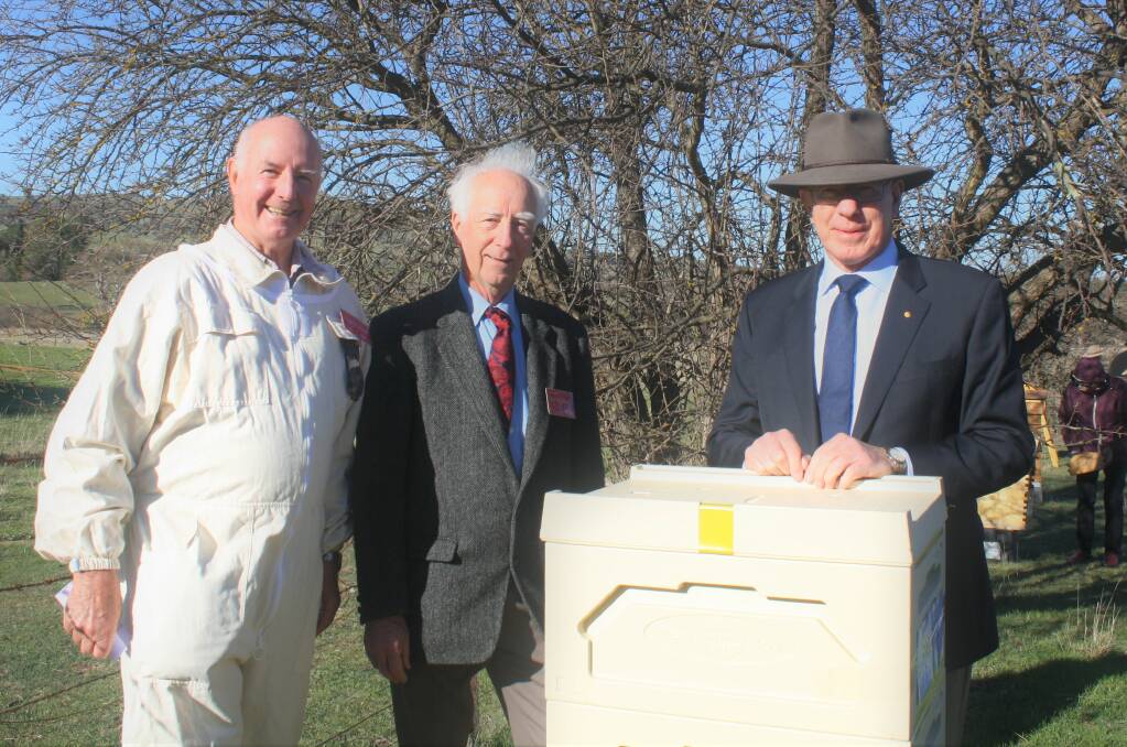 A HIVE OF ACTIVITY (L-R): Beekeepers Greg Weekes AM and Joe Morrissey show NSW Governor David Hurley the new apiary at Cooma Cottage. Picture: Hannah Sparks