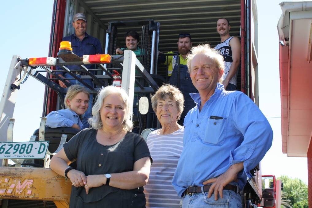ON THE MOVE: Merchant Campbell moves into the old Timmer's Original Bakery. Front row: Tibby, Margot, Barb and Chris Shannon. Back row: Oliver and Tom Kimpton, Matt Pollard and Mitch Curtis. Photo: Hannah Sparks.