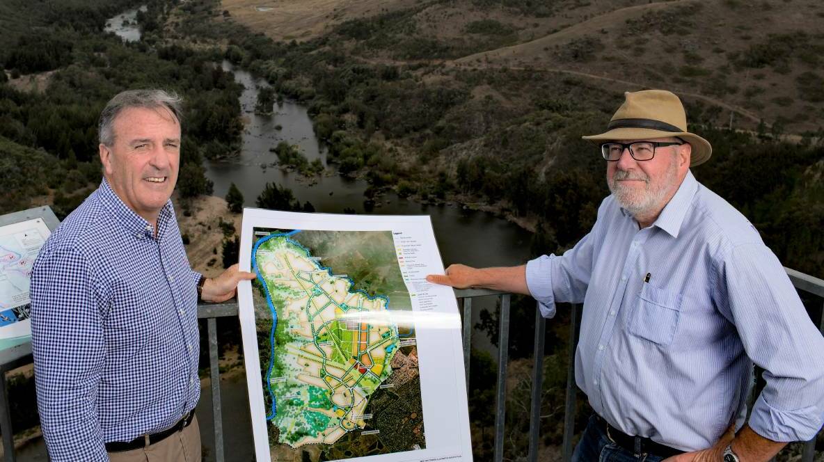 THE PROPONENTS: Riverview Developments' director David Maxwell and planning consultant Tony Adam at Shepherds Lookout, overlooking the Murrumbidgee River. Photo: Sitthixay Ditthavong