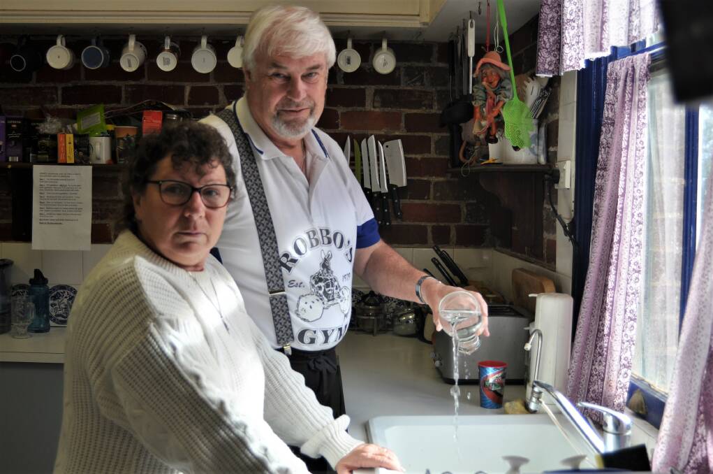 Money down the drain: Lyn and Terry Rudd won't get the water rebate. They complained to Yass Valley Council about their water but not until June. Photo: Hannah Sparks