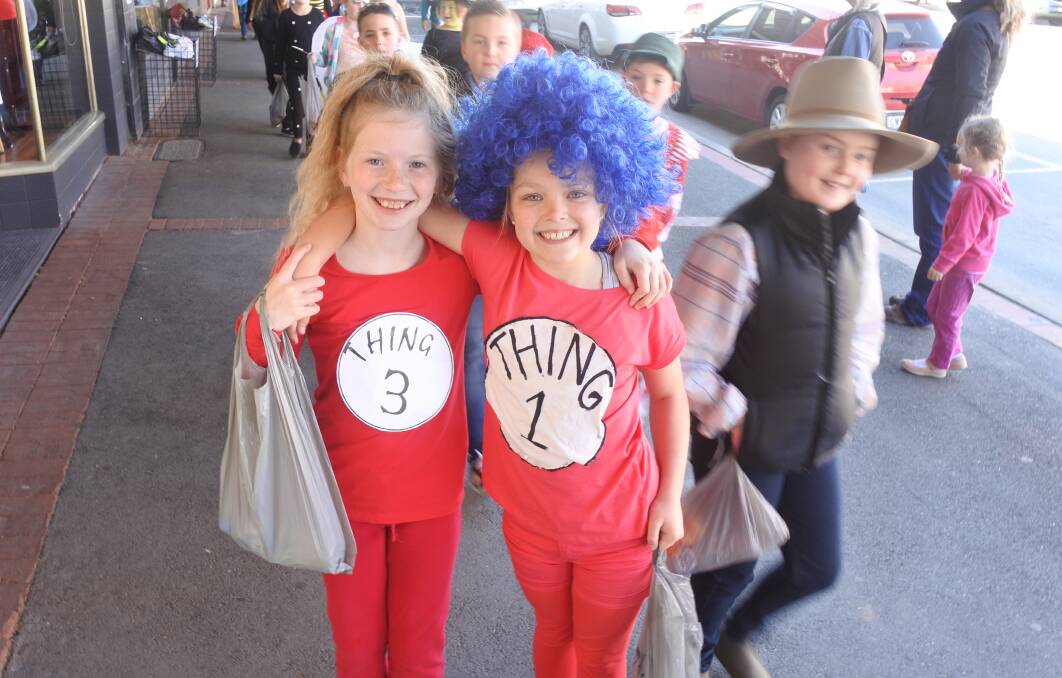 Local school students dress up as 'Thing 3' and 'Thing 1' during the 2016 Book Week Parade in Yass.
