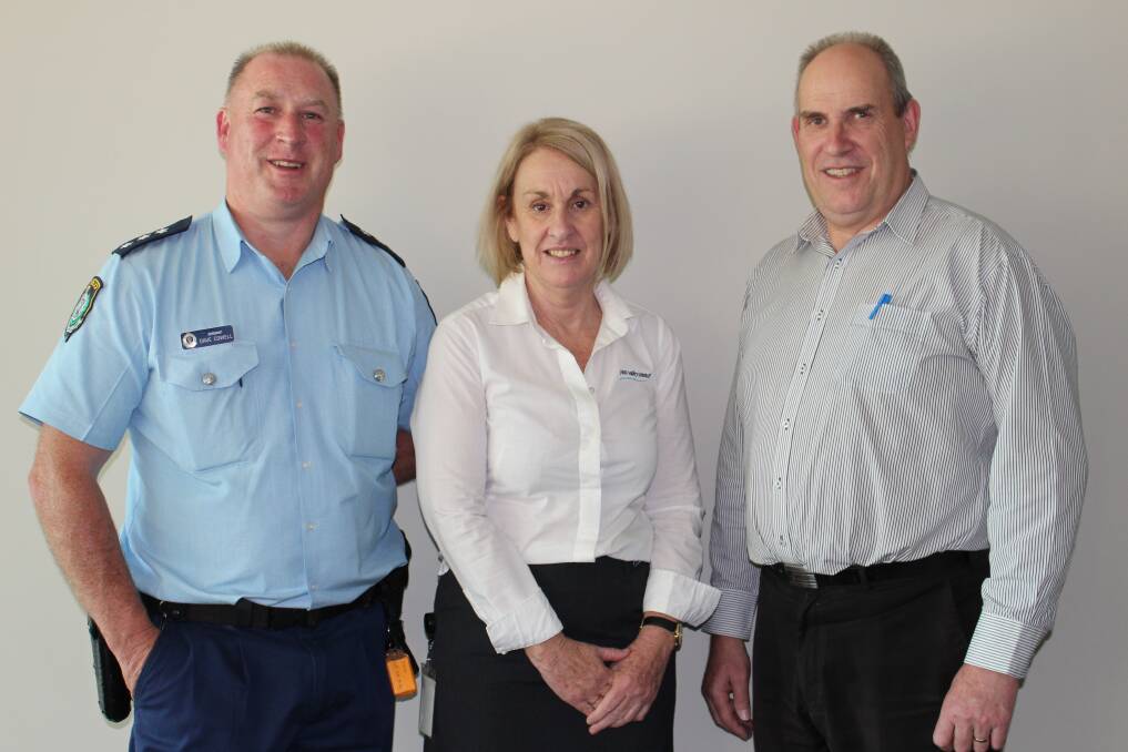TEAM WORK: Acting Inspector of Yass Police Station David Cowell with executive support Shirree Garland and local emergency management officer Tony Stevens from Yass Valley Council. Photo: Hannah Sparks