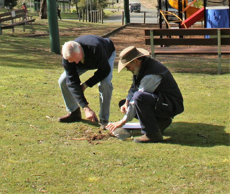 Jeff Brown and Steve Hogan collect soil samples.