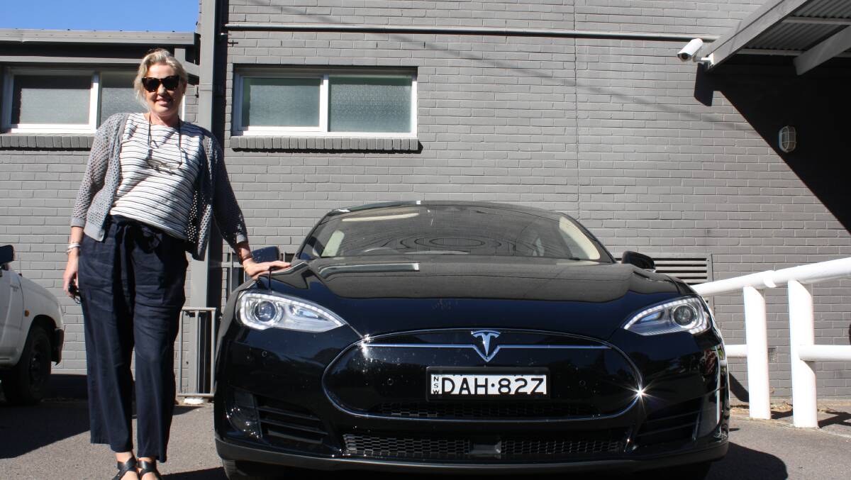 Mrs Raponi has owned a Tesla electric car since August and loves how much money she saves by recharging.
