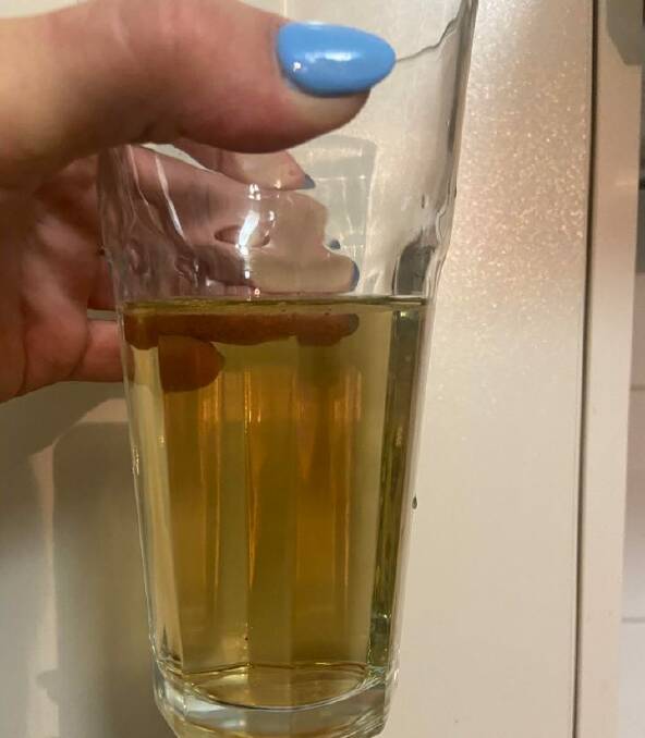 Yass resident Emma Rose shares a pic of discoloured water at her home. Pic: Supplied