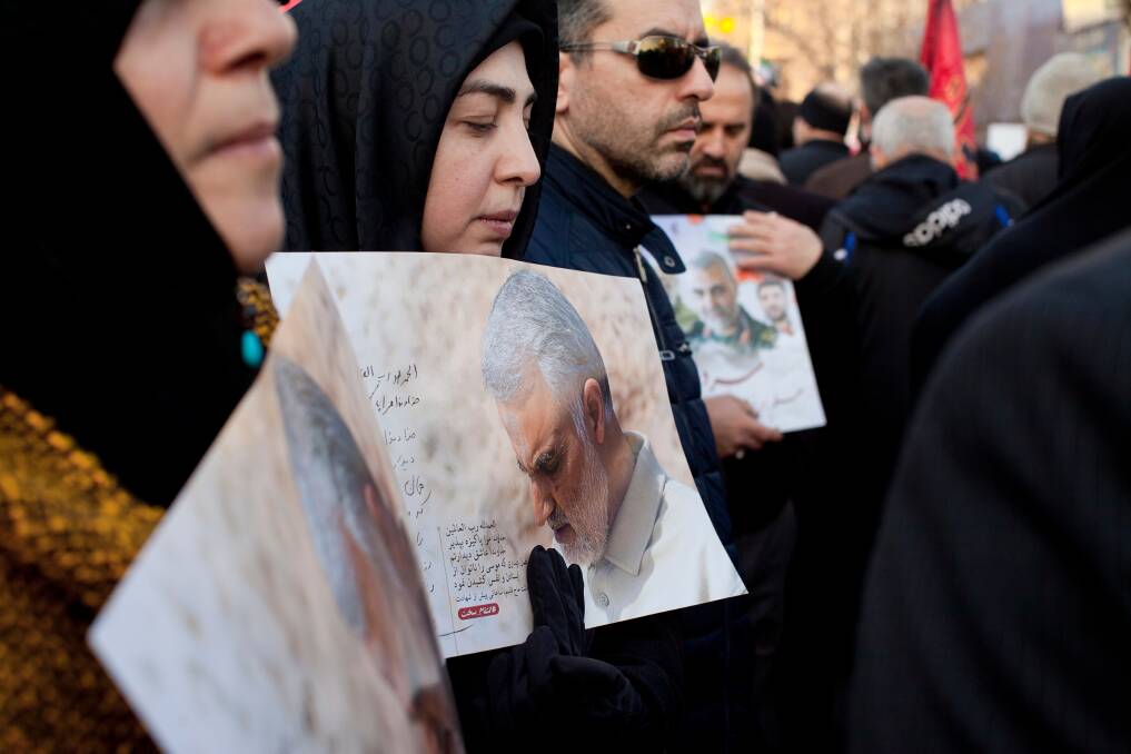 Targetted: Mourners at the funeral of Iranian commander Qasem Soleimani last week.