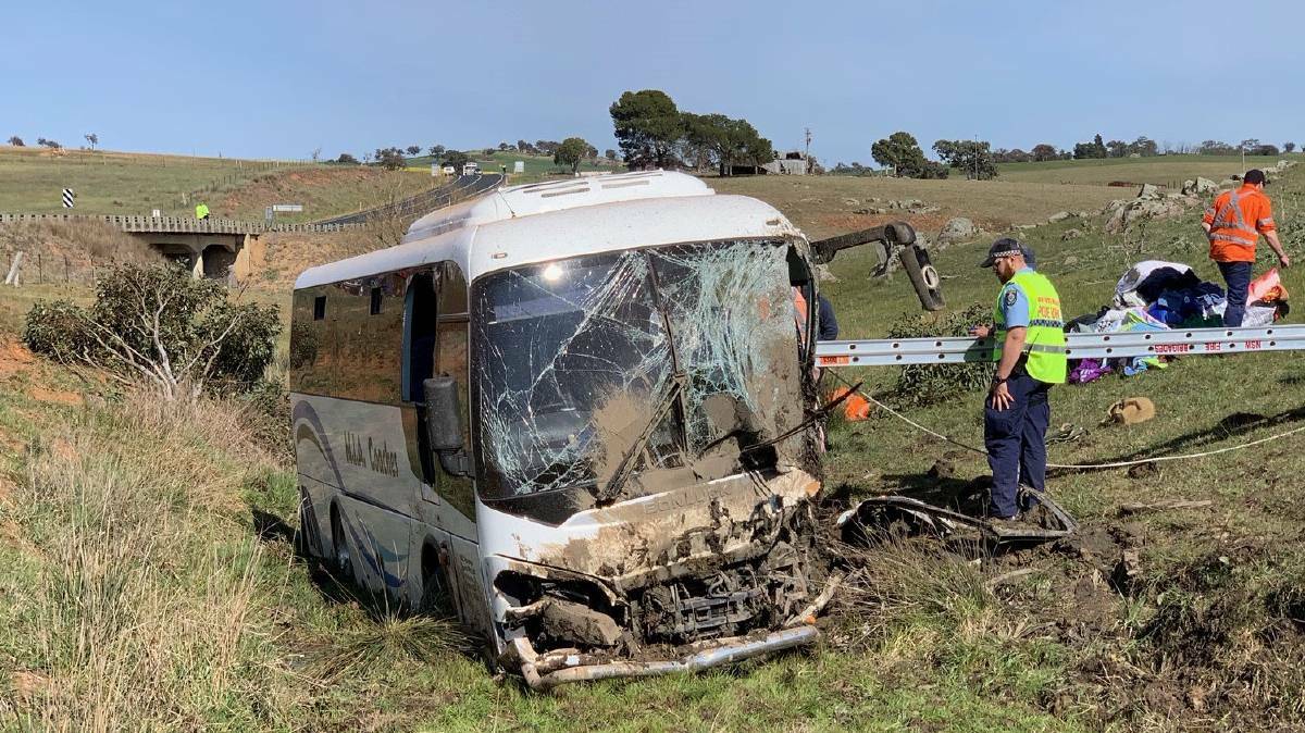 CRASH SCENE: 26 people were left injured when this bus crashed near Harden on Friday morning. Photo: NSW AMBULANCE