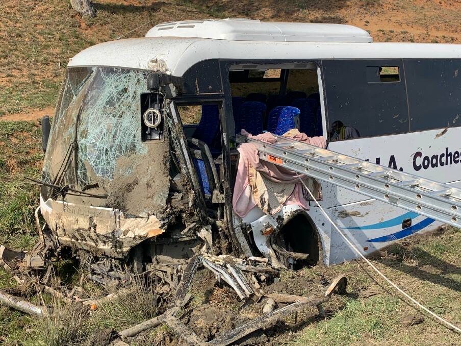 CRASH SCENE: 26 people were left injured when this bus crashed near Harden on Friday morning. Photo: NSW AMBULANCE