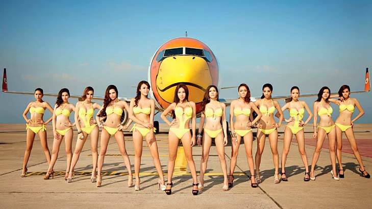 The cover image from the Nok Air calendar features models dressed in yellow bikinis - the signature colour of the airline.