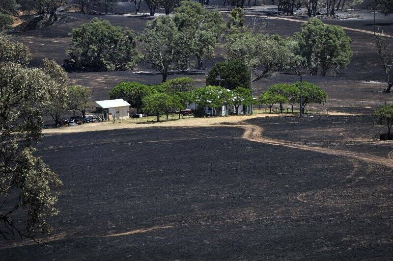 Although thousands of hectares were burnt out, many homes were saved. Photo: Jay Cronan.