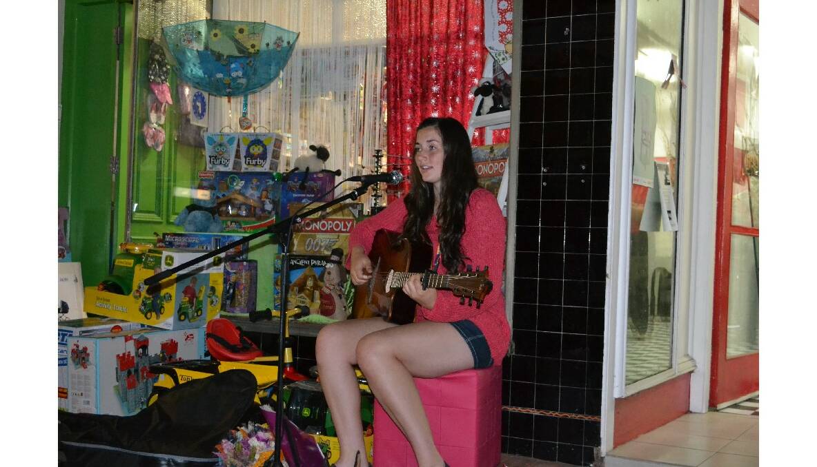 Siobhan McGrath busked well into the evening, outside Kidz Blitz.