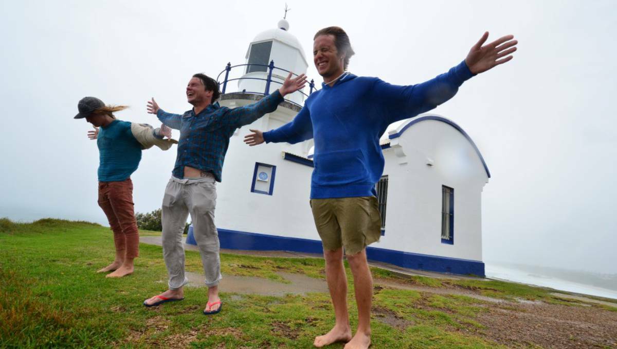 Blair Smith, Andrew Forteneery and Danny Hampson battled the strong winds at Port Macquarie on Monday. Photo: Nigel McNeil/Port Macquarie News