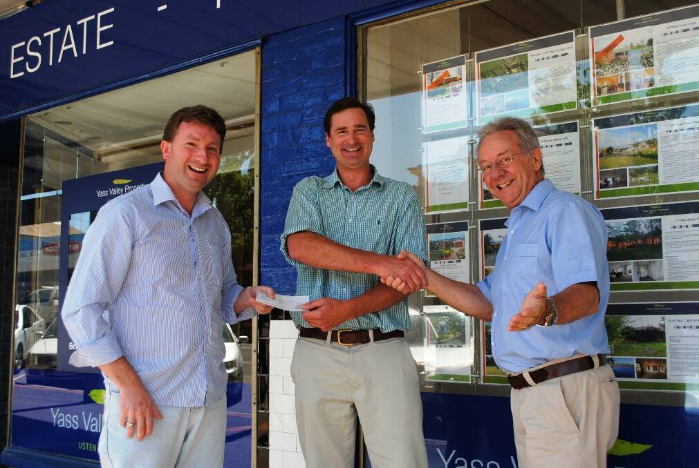 Michael Pilbrow (left) and David Grant (right) receive a cheque from Andrew Curlewis (centre) as a donation for the future of the Rae Burgess Centre. Mr Curlewis is the first of, hopefully, many donors toward the Friends of Rae Burgess Centre.