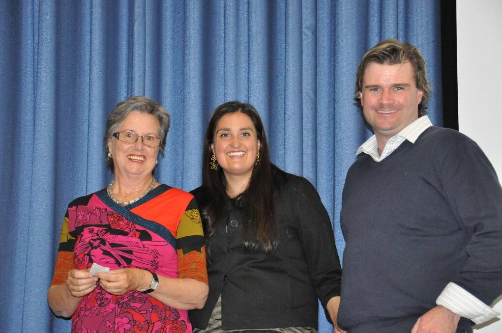 Margaret Reidy drawing the raffle with Veronica Olmos nad Greg Holt from Yass Caltex Woolworths service station.