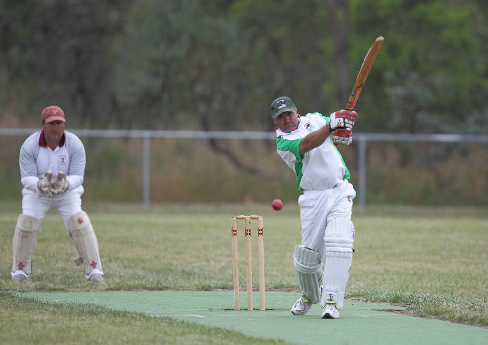 Mark Dyball slashes a delivery away for the Buffaloes. However, it was to no avail as his side lost comfortably.