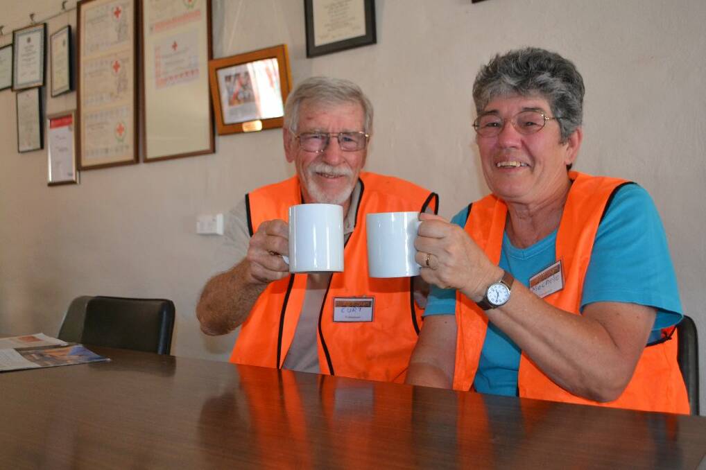 Curt and Mechele Squiers enjoy a cup of tea after a long day on the job for BlazeAid. Photo: Oliver Watson.