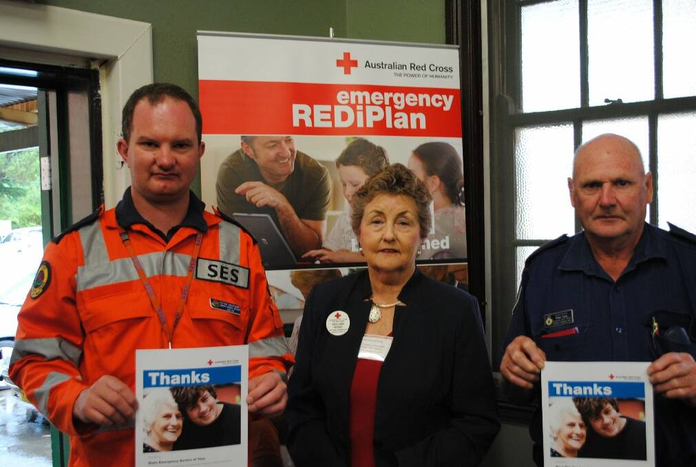 PREPARED: Pete Chatwin, operations officer for the SES, Noeleen Hazell, team leader for Yass Personal Support and Peter Dyce, RFS communications safety officer for the Southern Tablelands zone.