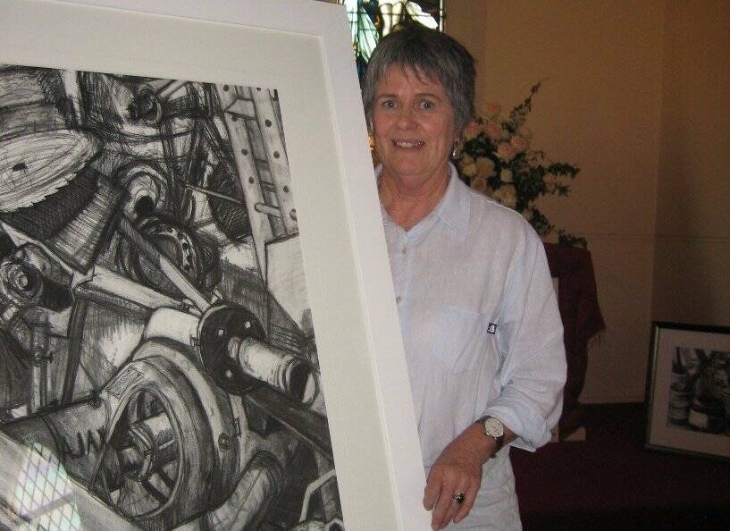 Lorraine Blackwell with one of her themed artworks, which impressed John McClung.